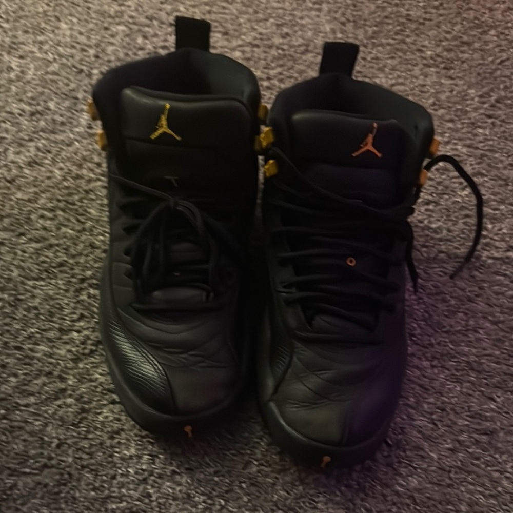 Black and Gold Air Jordan Sneakers